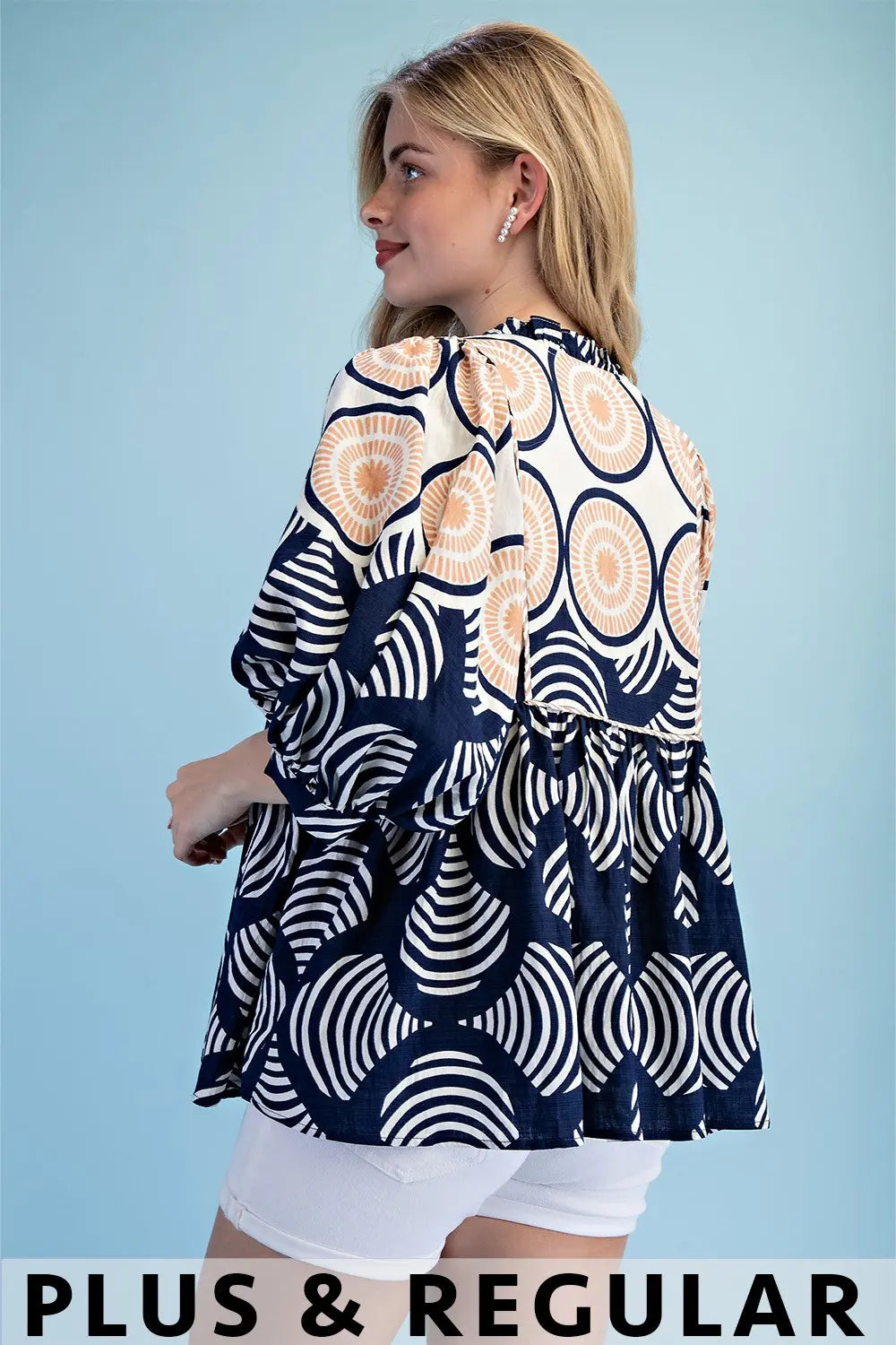 Printed Babydoll Top with a Ruffled Neck by Gigio
