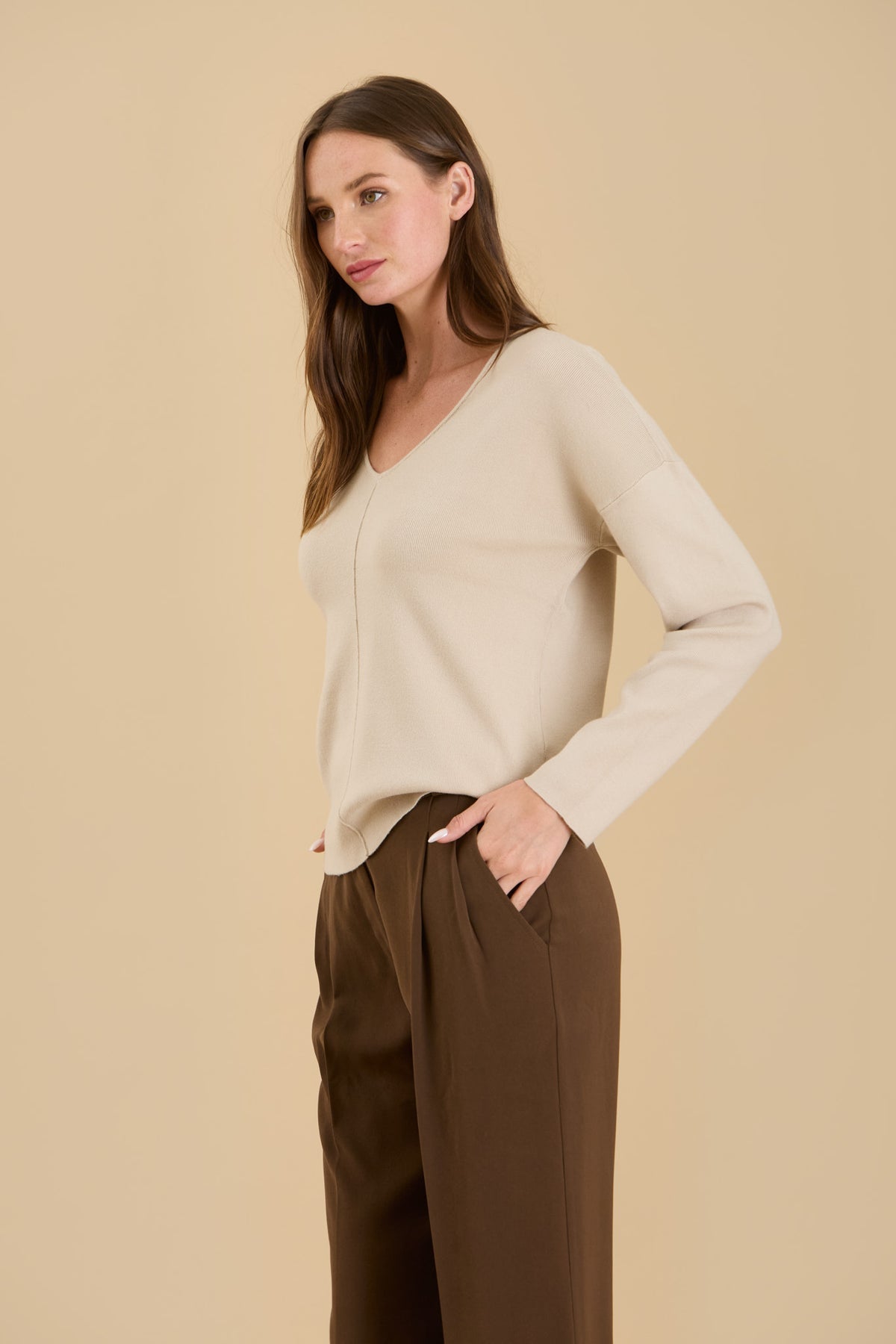 Solid V Neck Front Seam Knit Sweater by Blu Pepper