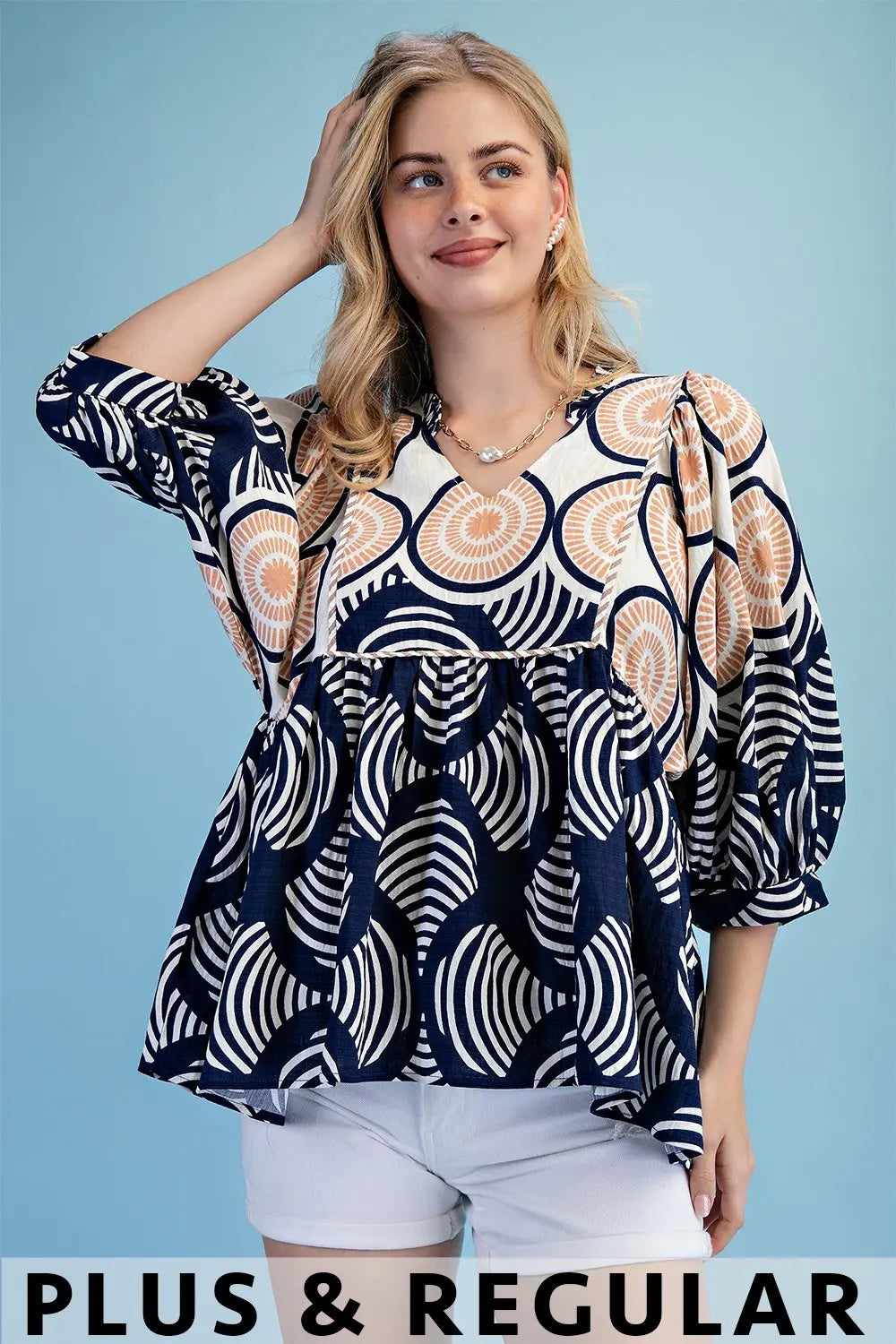 Printed Babydoll Top with a Ruffled Neck by Gigio