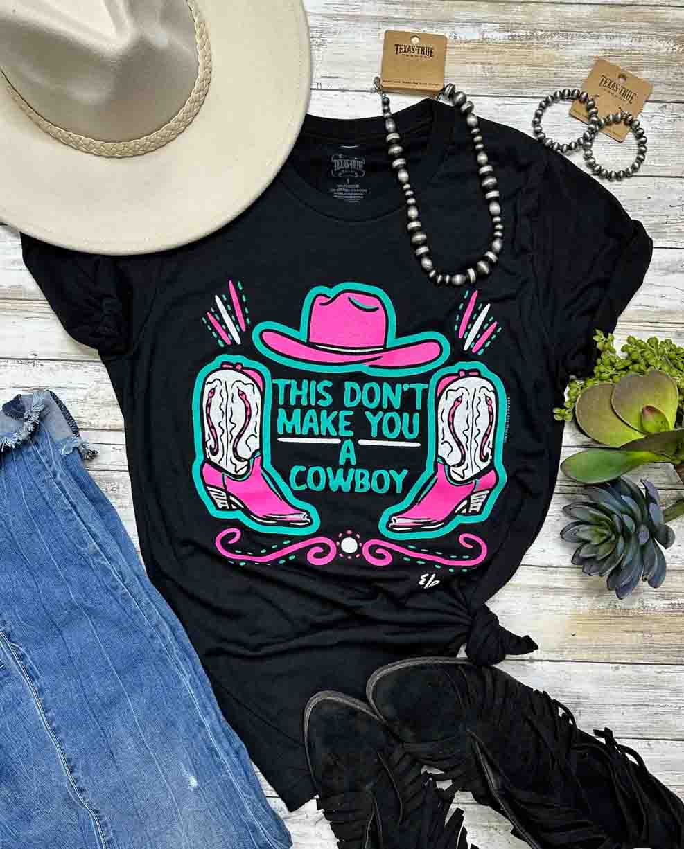 This Don't Make You a Cowboy Tee in Black by Texas True Threads