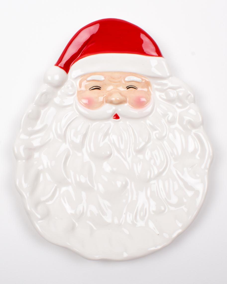 8 Oak Lane Red Santa Dessert Plate. White ceramic plate in the shape of Santa's head with red hat and white beard.