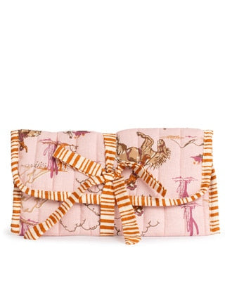 Light pink quilted Howdy Hunny jewelry roll with a Western horse print and striped ribbon tie from The Royal Standard.