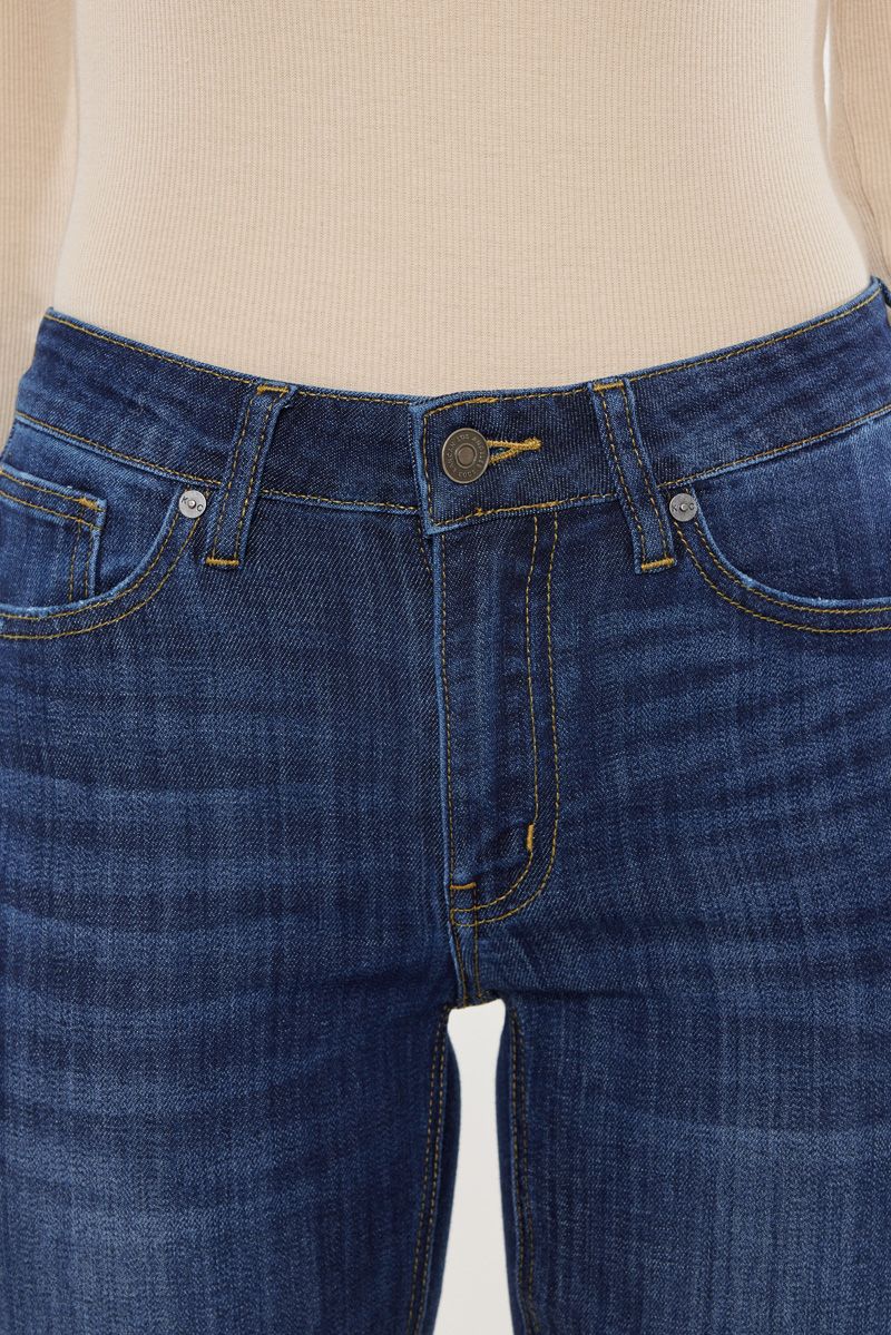 Petite Mid-Rise Flare Jeans in Dark Blue by KanCan