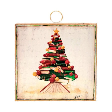 Kross Mini Book Stack Christmas Tree, a charming holiday decoration featuring books stacked to form a festive tree with ornaments and a star.