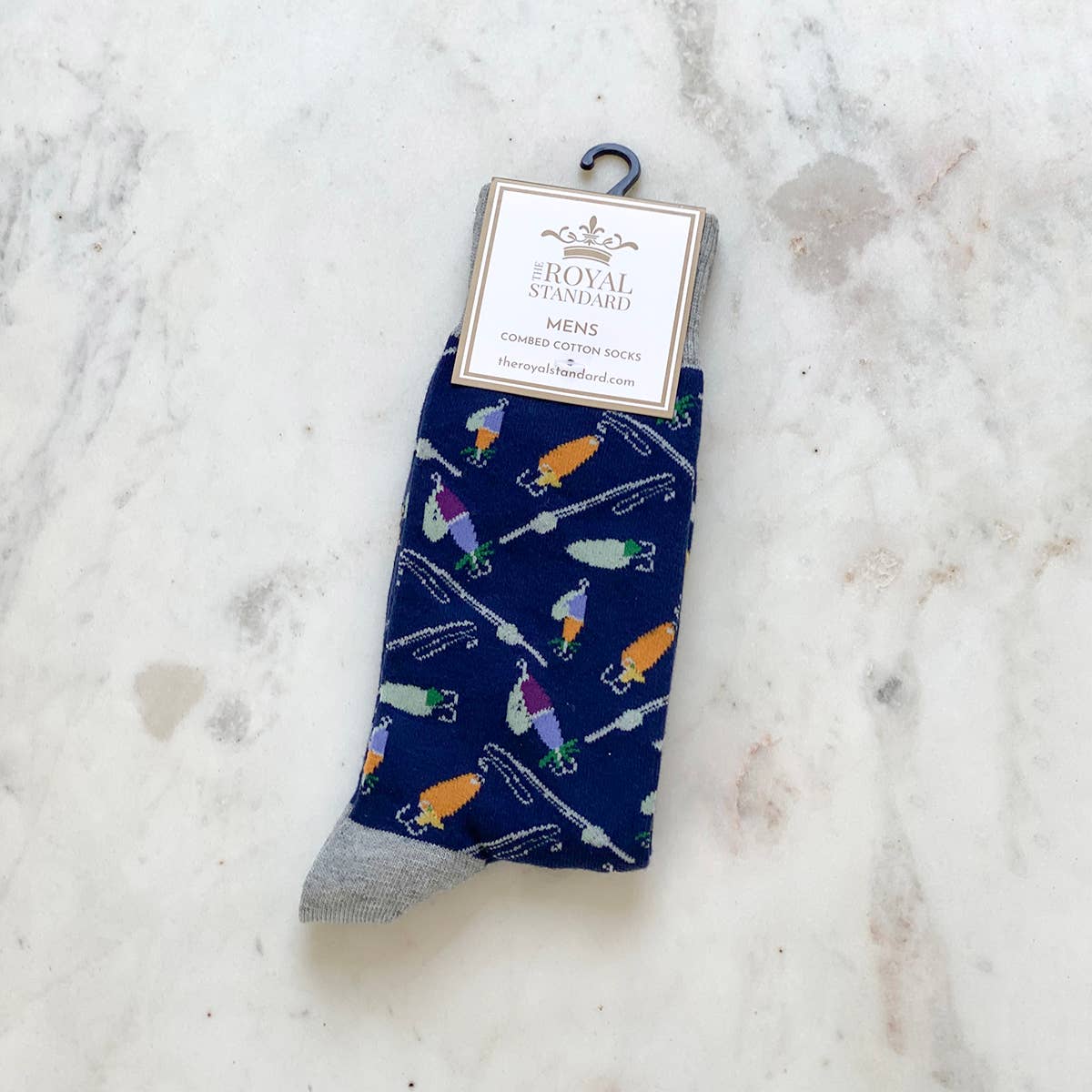 The Royal Standard Men's Hook Line And Sinker Socks in navy with fishing lures, gray heel/toe. Combed cotton.