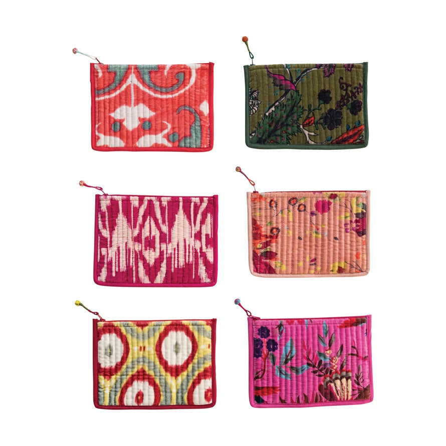 Six Creative Co-op Quilted Cotton Velvet Zip Pouches in various colorful patterns like floral, ikat, and abstract designs.